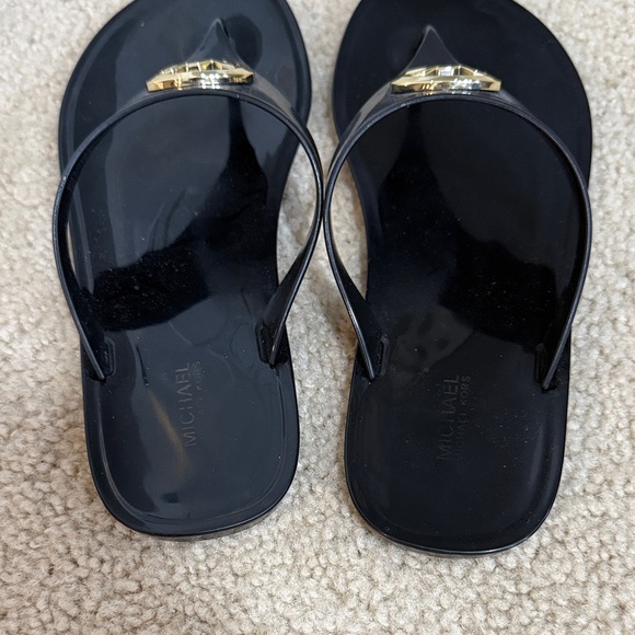 Michael Kors Black Flip Flops with Gold Emblem - Picture 2 of 3